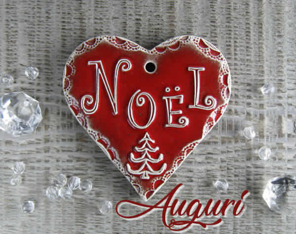 immagine con un cuore e dentro scritto Noël, ossia Natale in francese